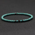 Bracelet avec une Croix et des Perles Bandol